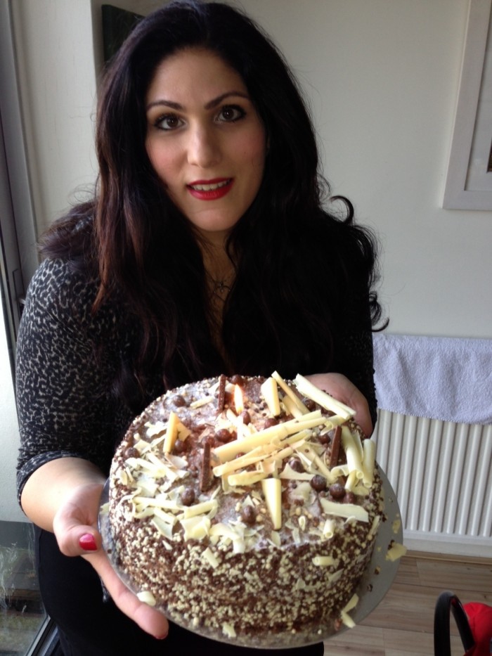 Vicki holding a Birthday cake