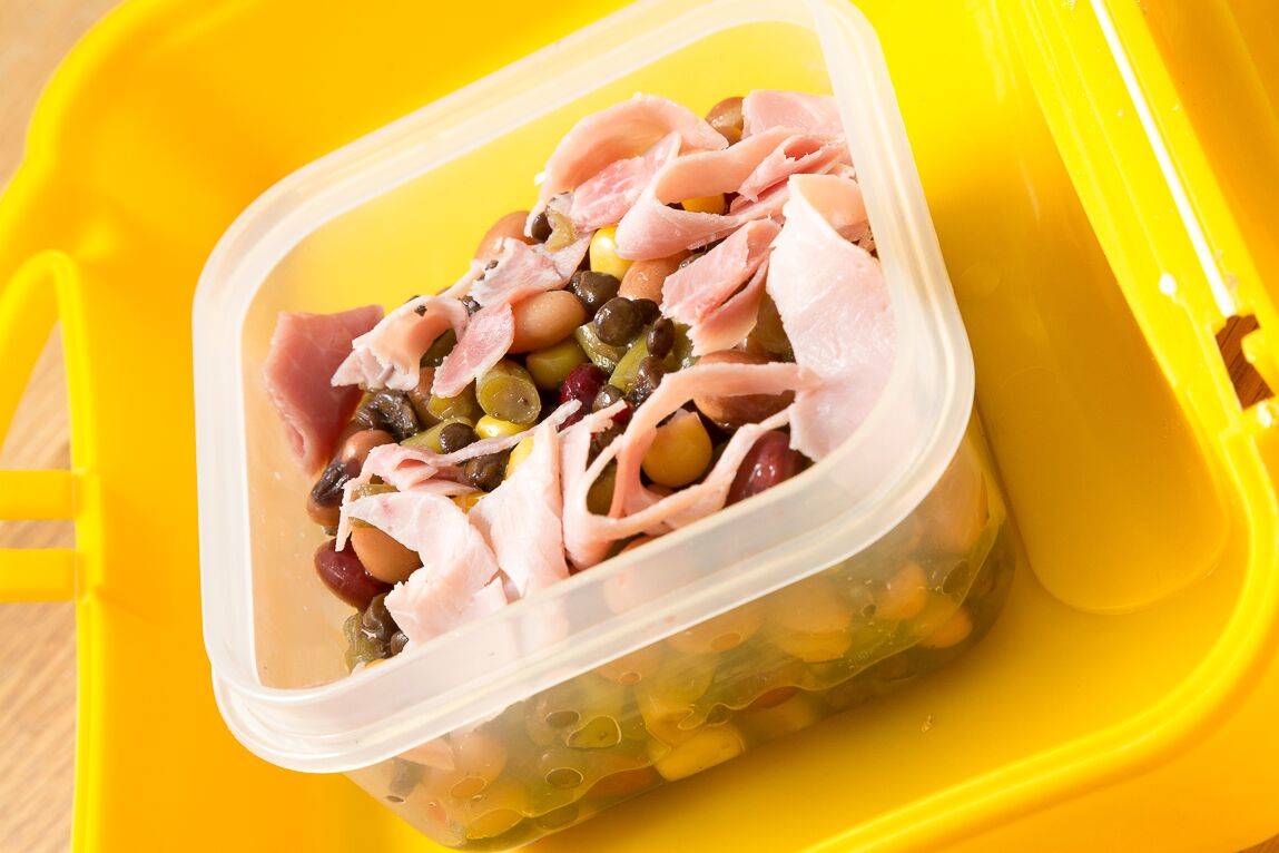 A lentil and bean salad with sweetcorn and ham.