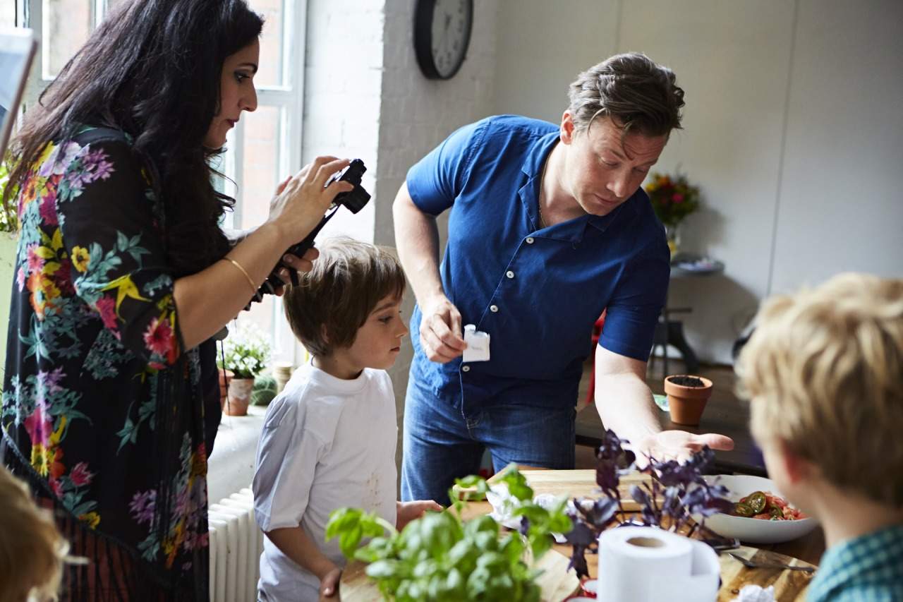 Blogger Vicki of Honest Mum takes a picture of Jamie Oliver at his workshop