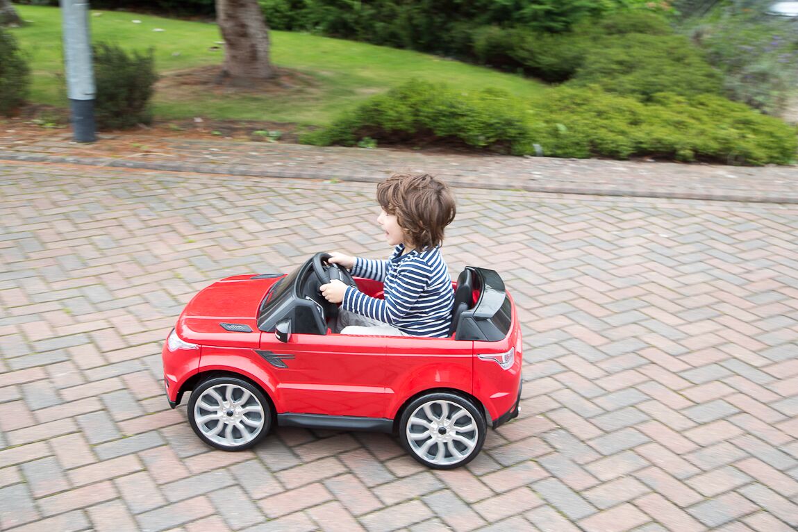 Parenting Blogger's son plays in kids Range Rover