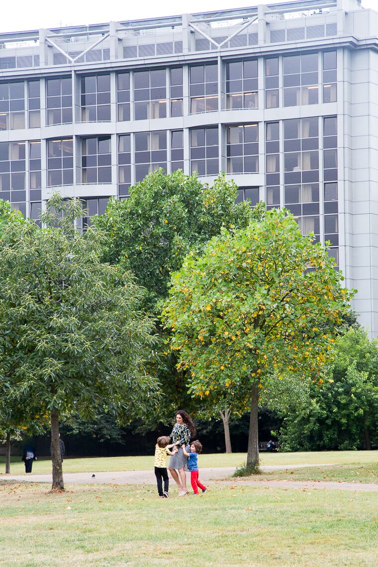 family playing in Kensington Gardens