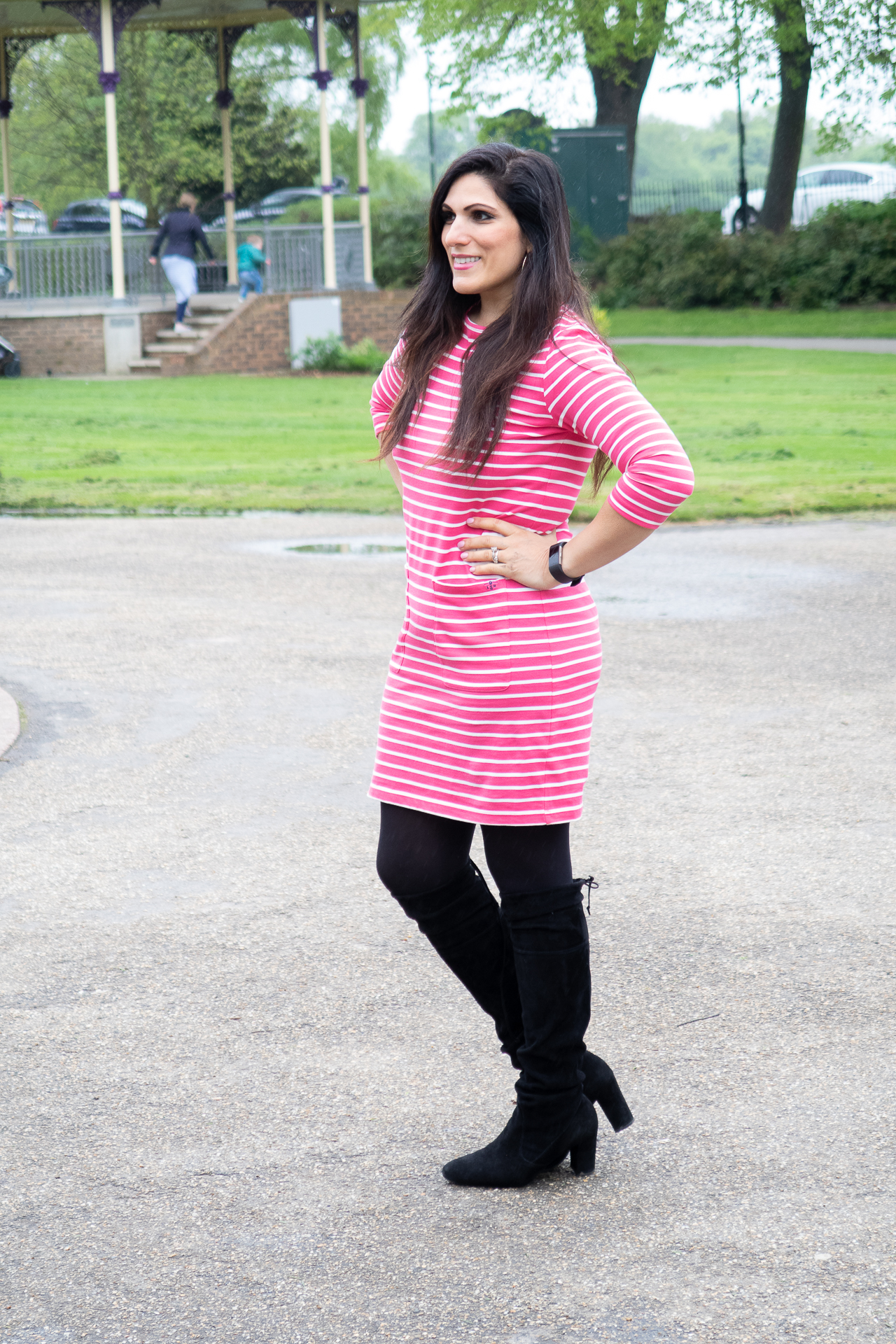 pink and white striped dress with over the knee boots