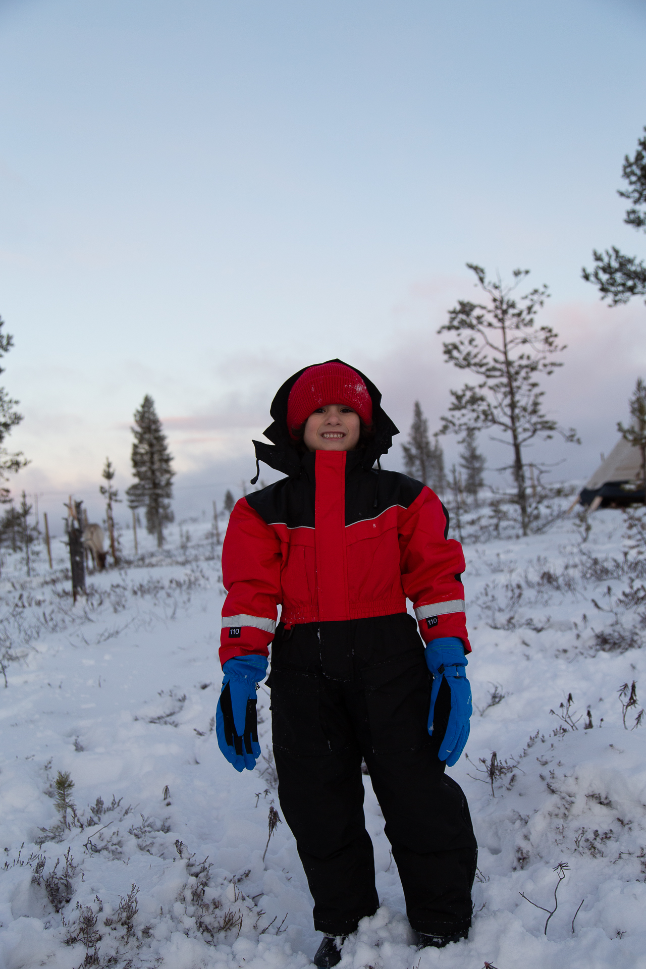child in snowsuit in Lapland, Finland