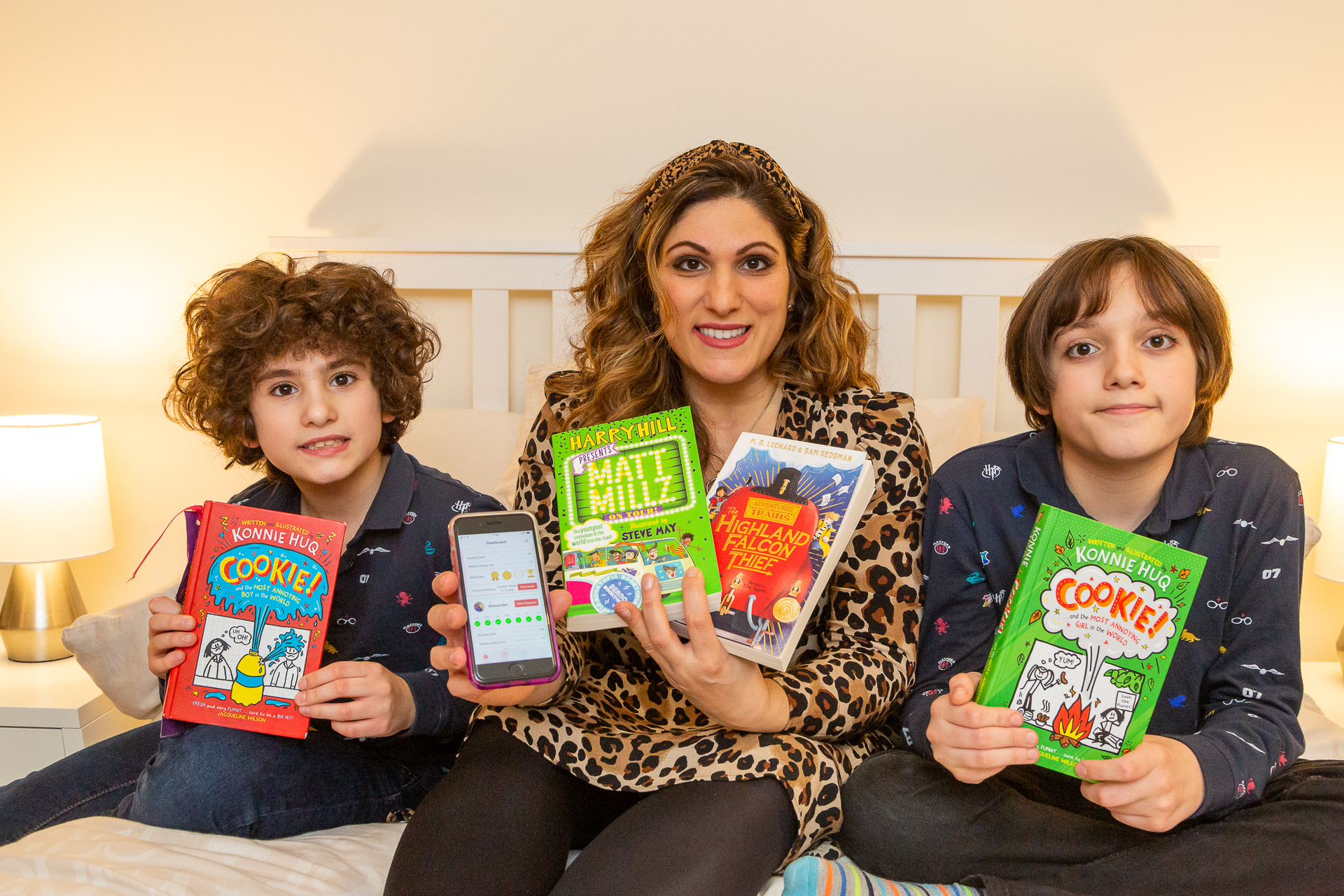 Vicki of Honest Mum and kids with the Readingmate app and books