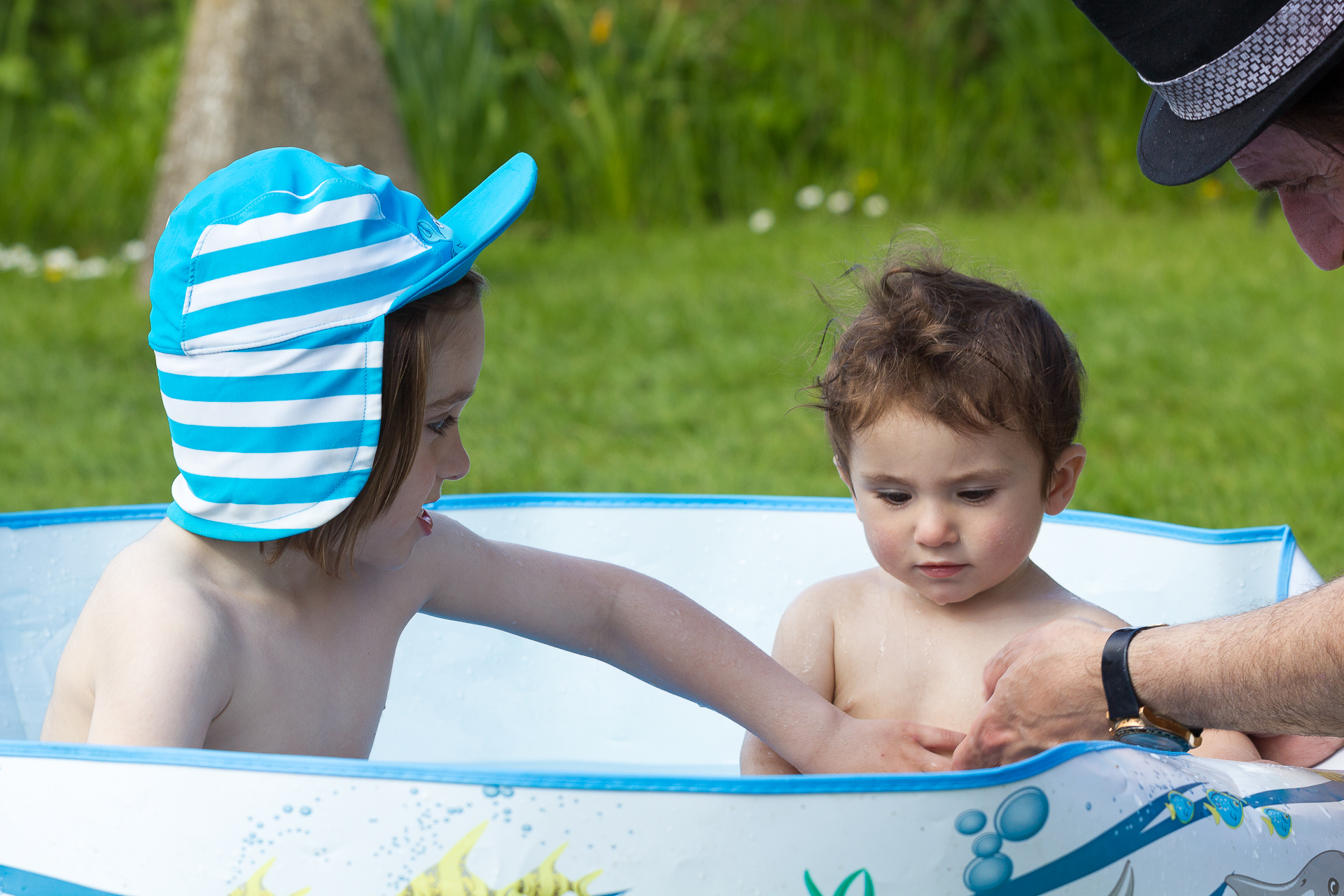 children in the paddling pool
