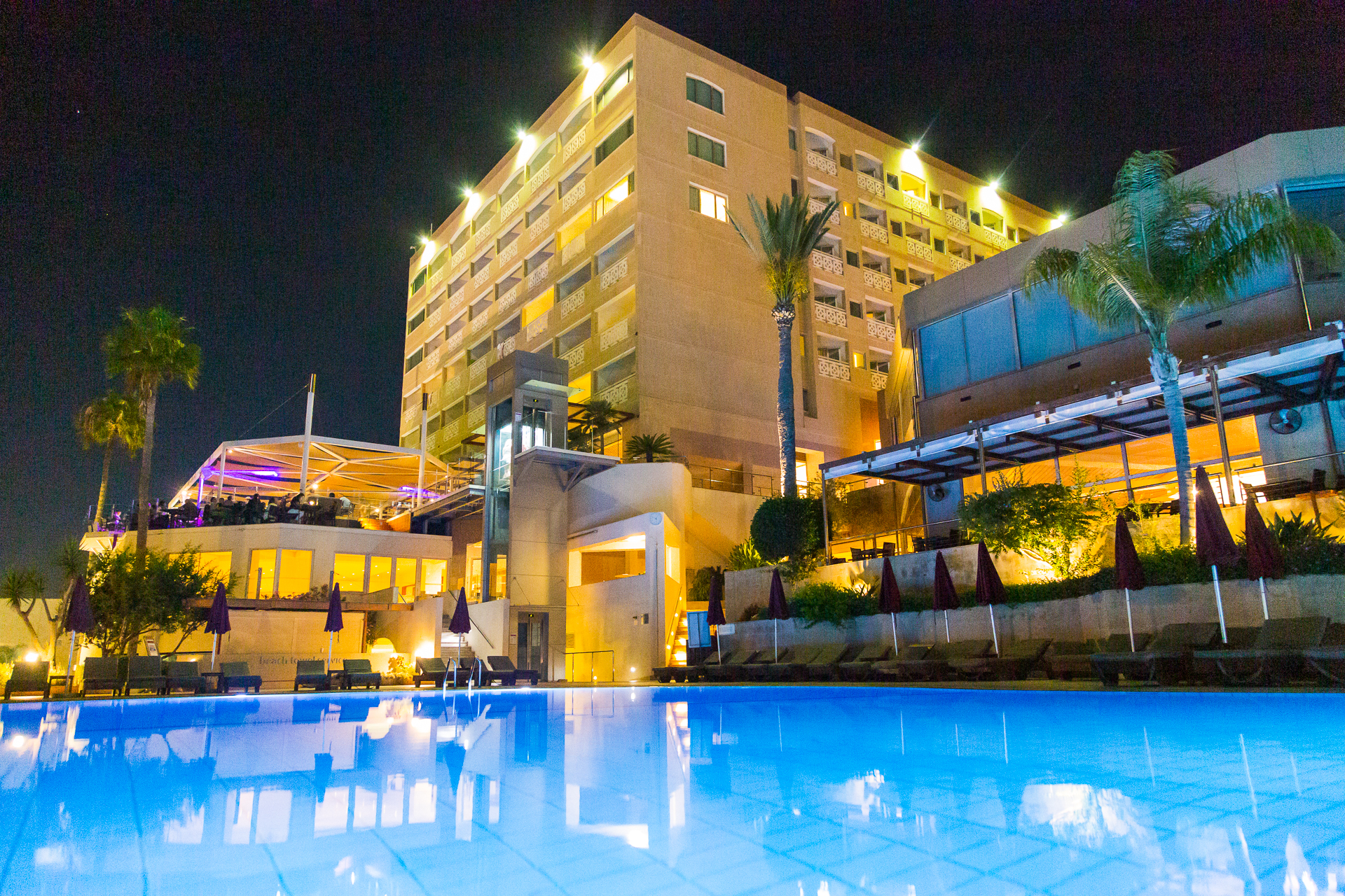 hotel and pool by night